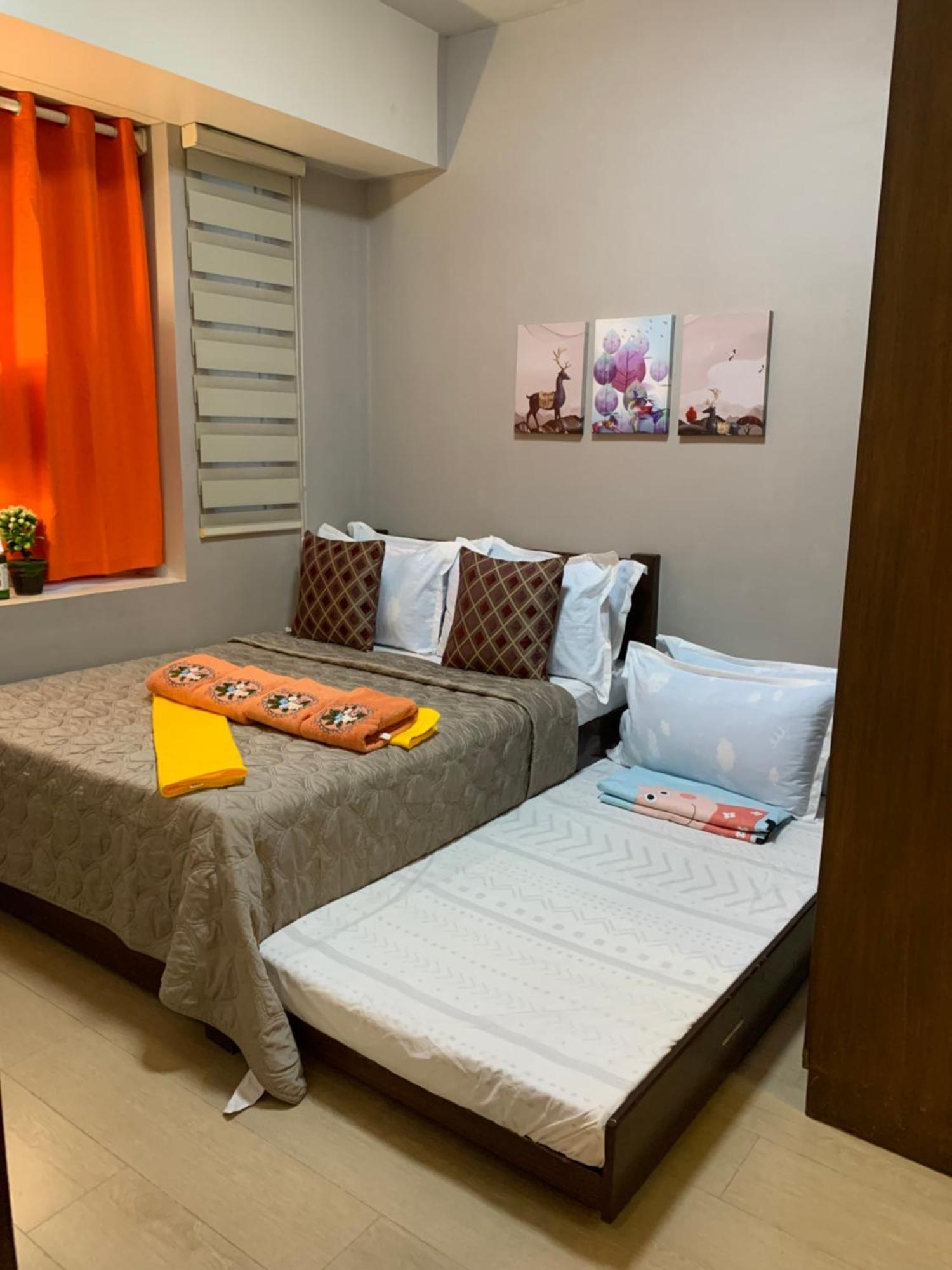One Palm Tree Villas Condominium - Studio 10O With Balcony - Across Terminal 3 Airport Manilla Buitenkant foto